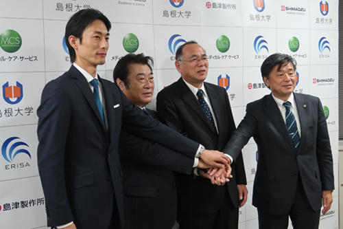 島津製作所，メディカル・ケア・サービス，ERISA，島根大学の4者で認知機能に関連する生体マーカーの開発を