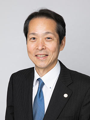 「新会長に選任された上田克彦 氏」