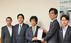 ヘルスケアテック議連の田村憲久会長（写真左から3人目）とAI医療機器協議会の多田智裕会長（同4人目）の提言手交（写真左から，今枝宗一郎衆議院議員，城内　実厚生労働大臣，田村会長，多田会長，大空幸星衆議院議員）